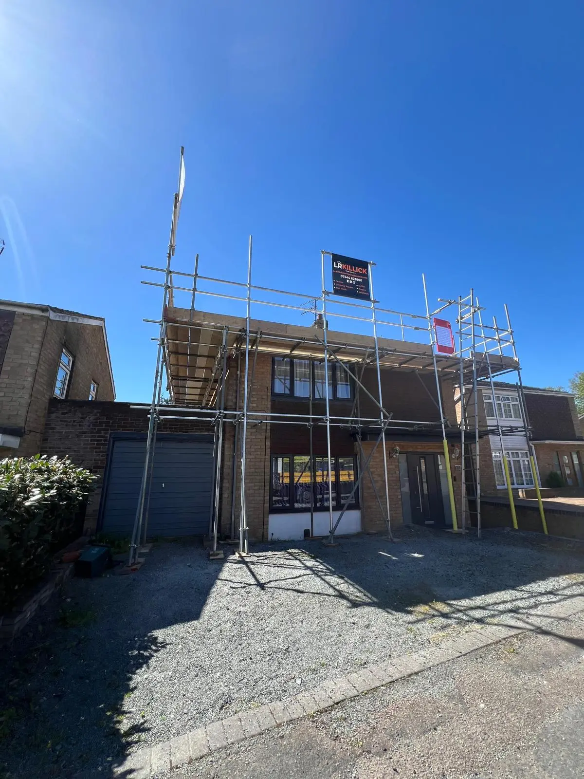 Scaffolding across a residential front elevation